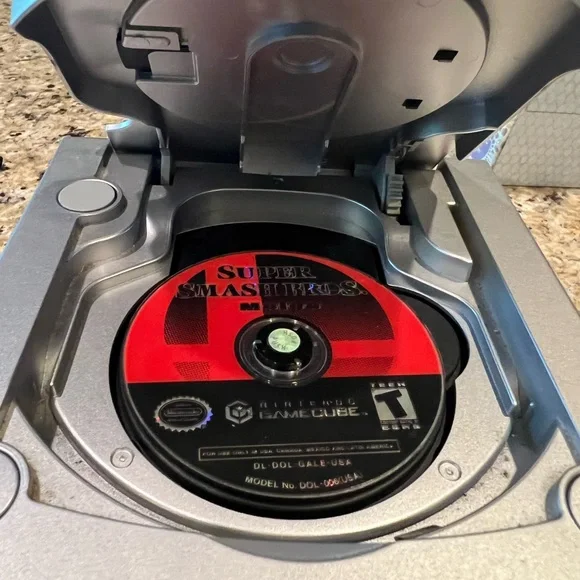 Nintendo GameCube with two controllers and cables, Super Smash Melee game